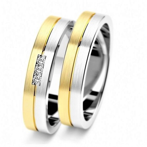 Эксклюзивные обручальные кольца из белого и желтого золота о-1105 купить ина заказ в Санкт-Петербурге по лучшей цене.
